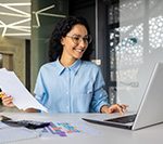 Business owner working at desk unworried by their website due to Ocean County webite designer